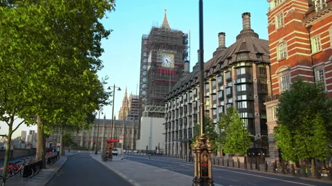 A Close-up look of Big Ben in construction with scaffolding around in 4k. Stock Footage 139942831