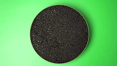 Close-up look to Caviar Deep brown to gold from the Osetra sturgeon in 4K. Stock Footage 149616144