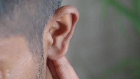 Close-up look at human ear and surrounding skin Stock Footage 337333817