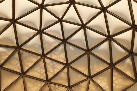 Close look from inside onto the geometric pattern of one of the domes, cupola Stock Photos
