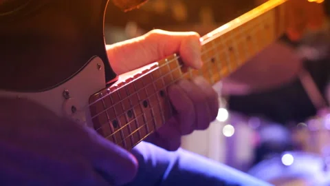 Close up look of a man playing a solo guitar, horizontal video Stock Footage 233167036