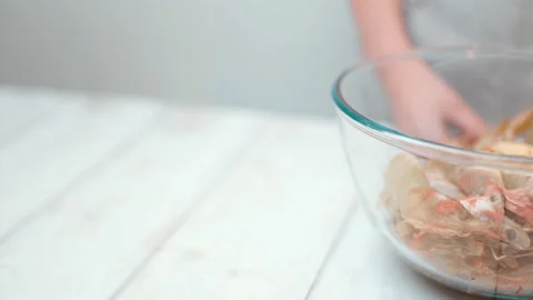 Close-up look of mixing and marinating a bunch of shrimps/prawns in 4k. Stock Footage 138285780