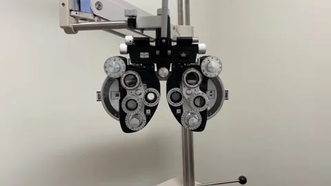 Close look on phoropter machine used for eye examination and glasses tests in op Stock Footage 180489253