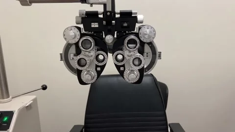 Close look on phoropter machine used for eye examination and glasses tests in op Stock Footage 180489323