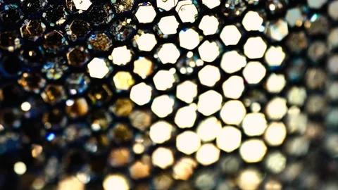Close look at shiny hexagon pattern with reflections Stock Footage 328026825