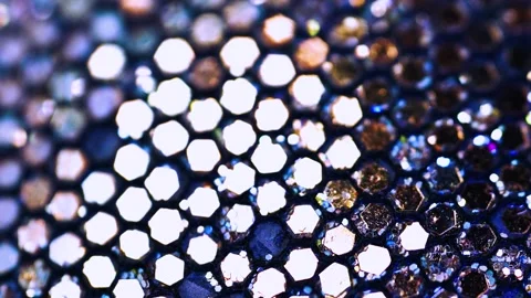 Close look at shiny hexagon pattern with reflections and vivid colors. Stock Footage 328037926