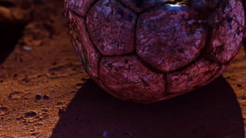 Close look at a textured stone with shadows in a dimly lit environment Stock Footage 339504476