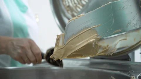 Close look worker cleaning machine from Hemp balm in Hemp CBD laboratory Stock Footage 116611220