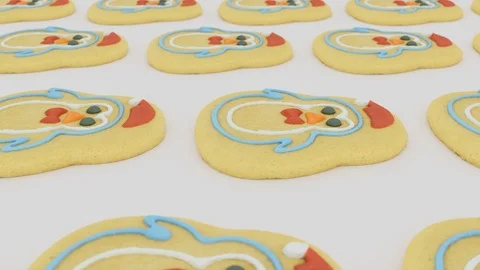 Close up loopable pan across santa themed gingerbread man biscuits - 4k loop Stock Footage 120386841
