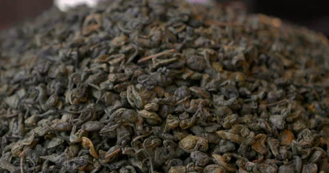 Close up of loose leaf tea texture natural dried tea leaves background Stock Footage 330903076