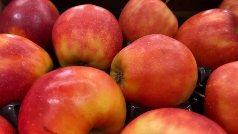 Close-up, a lot of apples lying close to each other Video stock 127555025