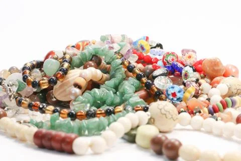 Close Up of Lot of Multi Colored Beads Natural Stone Collection Presentation Foto stock