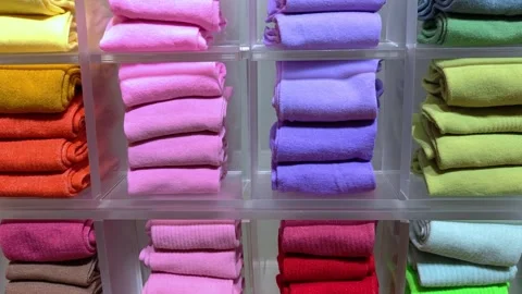Close-up lots of new socks on the shelf in a clothing store. 動画素材 301161303