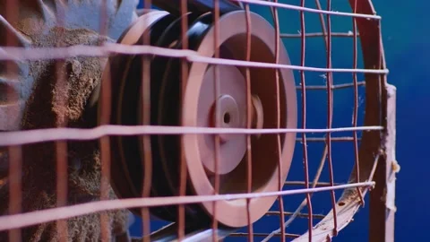Close-up of loudspeaker behind wire mesh fence Stock Footage 327572754