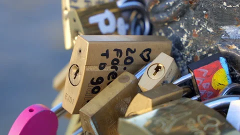 Close up on love locks hanging on the Pont des Arts bridge in Paris, France Stock Footage 234978504
