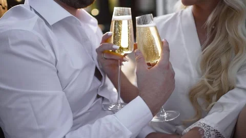 Close up lovers celebrating and drinking champagne while enjoying the evening Video stock 278325255