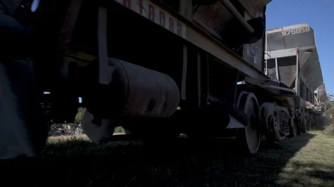 Close up with low angle of a cargo train - hand held recording Stock Footage 126808742