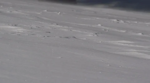 Close Low Angle Snow Cornice Blowing Wind Powder - slowmo Stock Footage 22562954