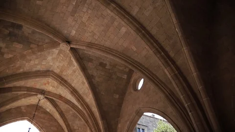 Close-up low angle still shot of an old castle building ruin with arch windows Video stock 128597402