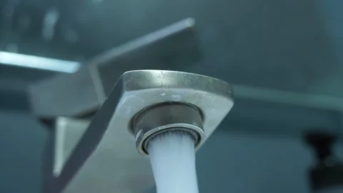 Close-Up low-angle video of Crystal Clear Water Flowing From a Modern Faucet Видео 262668505