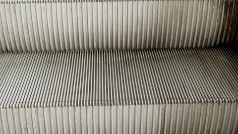 Close up low angle view to escalator stairs while moving in subway skytrian.. Stock Footage 294917771