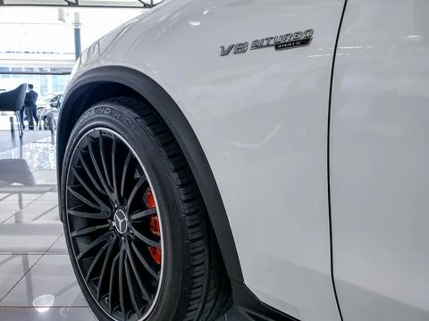 Close-up low angle view of a white Mercedes-Benz GLC 300 4Matic V8 SUV Stock Photos