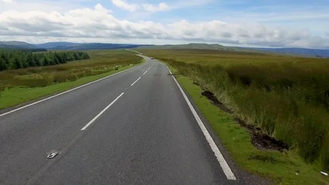 Close low drone view flyover speeding car Stock Footage 112387802