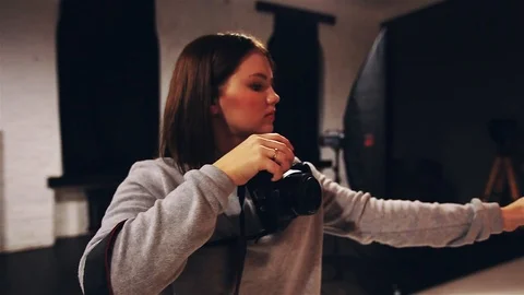 Close low light photo session girl photographer taking photos Video stock 85555601