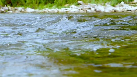 Close Up Low Over Fast Moving River Water Flowing Pass You On The Rocky River Stock Footage 200349525