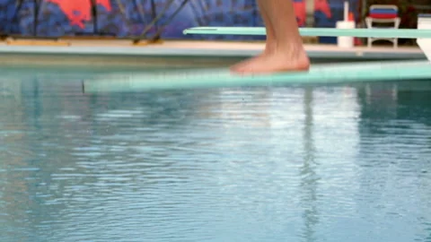 Close up low section view of Caucasian man diving into swimming pool Video stock 191365543