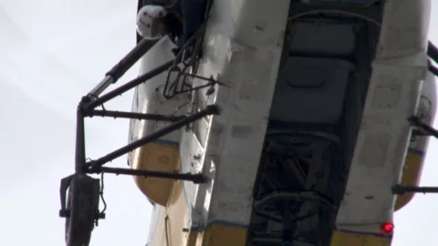 Close-up of lower fuselage of Ka-32 helicopter and operator of pilot. Video stock 106111333
