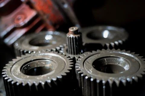Close-up of lubricated gear set with aligned steel teeth Stock Photos