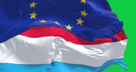 Close-up of Luxembourg and the EU flags waving isolated on green background Stock Footage 285862503