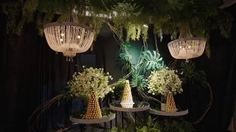Close Up of Luxury Wedding Dessert Table With Floral Arrangements and Crystal 스톡 동영상 332788487