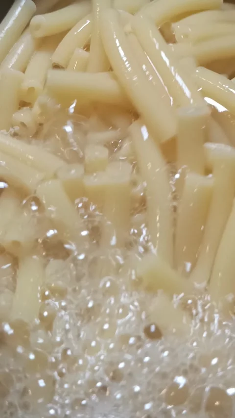 Close-up of macaroni pasta cooking Stock-Footage 342916038