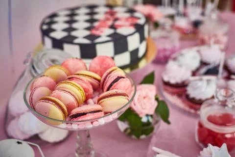 Close-up macaroon cakes on a candy bar Stock Photos