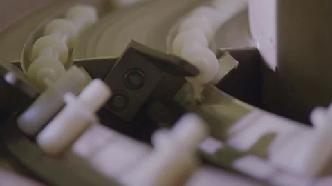 Close-up of a machine assembling a boxspring bed with precision, indoors, Stock Footage 270078671