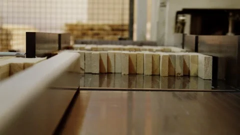 Close-up of a machine assembling wood blocks for a laminated timber panel. Stock Footage 316212703
