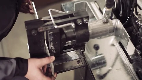 Close-up of machine bending a piece of metal. Stock-Footage 77006336