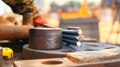 Close-up of machine bending steel bars Stock Footage 103086820