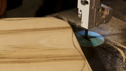 Close-up of the machine cuts wood on the drawn form Stock Footage 100745912