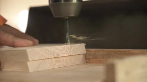 Close-up of a machine drilling a tree. woodworking shop. Stock Footage 163822759