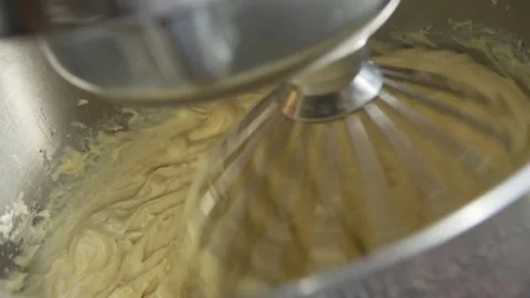 Close Up of machine mixing cream Stock Footage 238502790