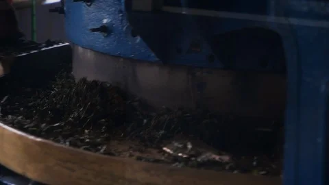 Close up of machine pressing fresh tea leafs in tea factory, Malaysia Stock Footage 146542274