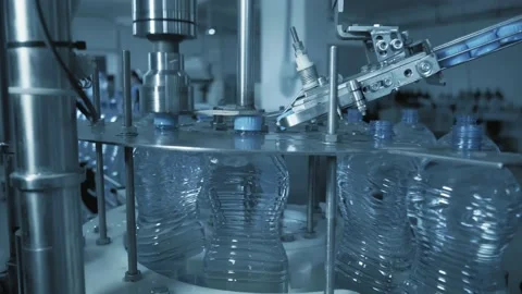 Close-up of the machine, producing plastic bottle. Stock Footage 131299676