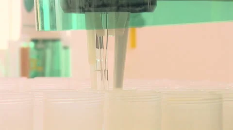 Close Up of Machine Taking Samples of Liquid From Containers Stock Footage 40619963