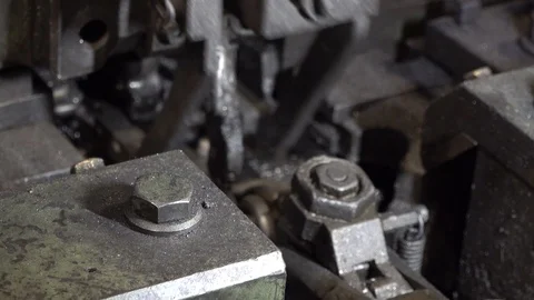 Close-up of machine working area for bending steel chains Stock Footage 113359716