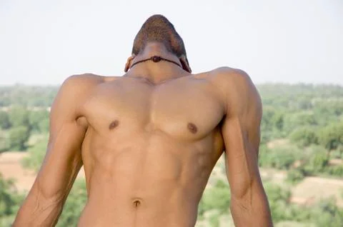 Close-up of a macho man stretching Stock Photos