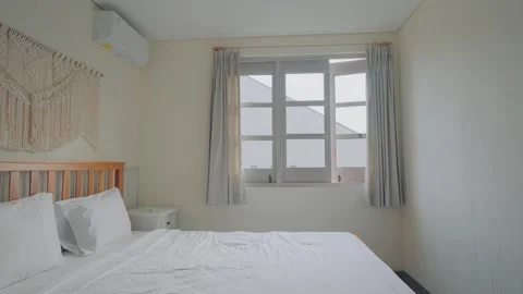 Close Up of Macrame Decor and Warm Bedside Lighting Stock Footage 276548404