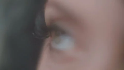 Close-up macro of beautiful female eye in slow motion Stock Footage 100895684